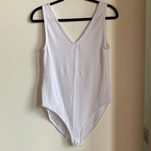 Gap V Neck body suit. White. Size Medium